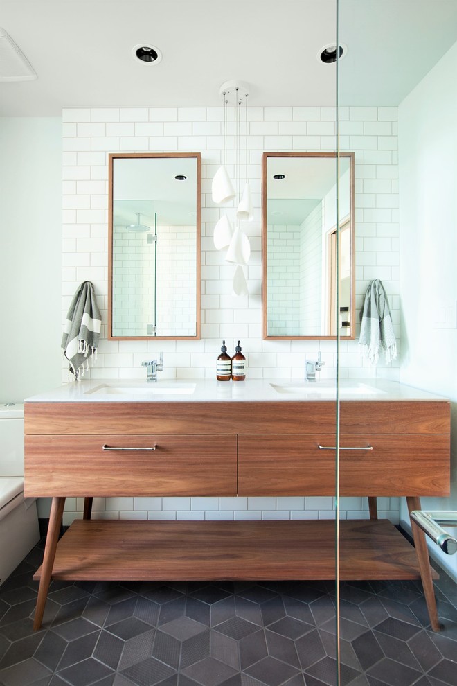Example of a mid-century modern bathroom design in Vancouver