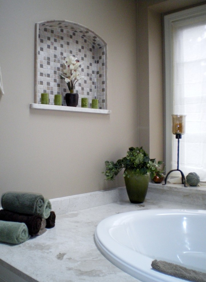 Mid-sized elegant master ceramic tile bathroom photo in Chicago with raised-panel cabinets, white cabinets, a two-piece toilet, brown walls, an undermount sink and marble countertops