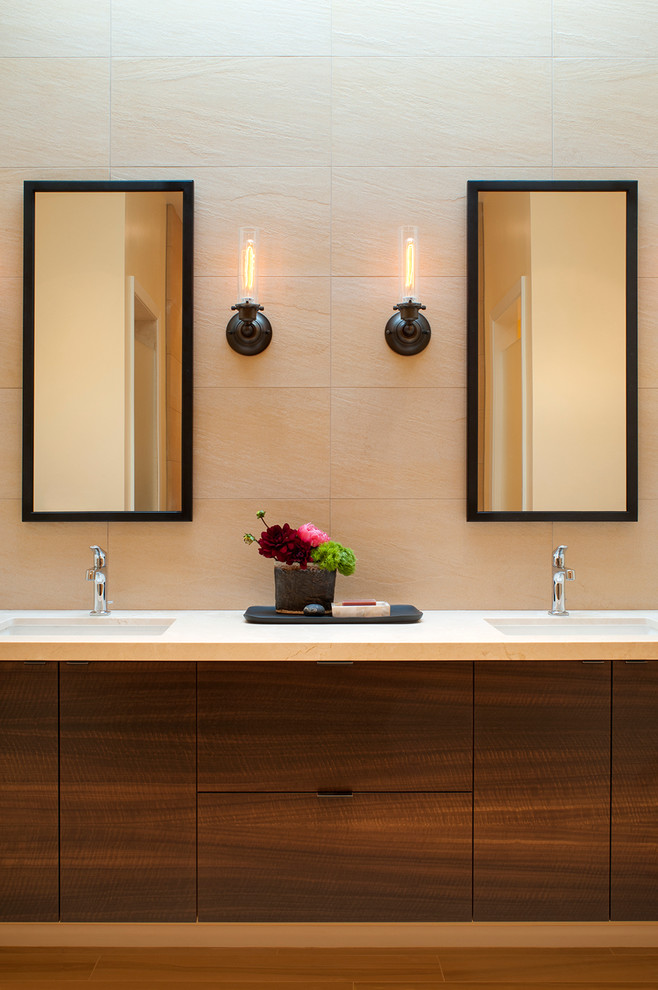 Design ideas for a contemporary bathroom in San Francisco with a submerged sink, flat-panel cabinets and dark wood cabinets.