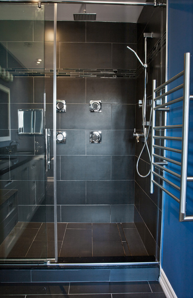Example of a mid-sized trendy master gray tile and ceramic tile ceramic tile bathroom design in Toronto with shaker cabinets, white cabinets, blue walls, an undermount sink and solid surface countertops