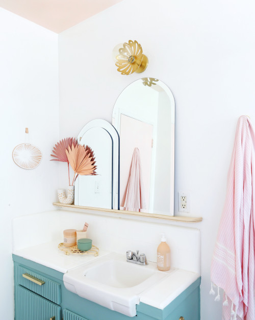 Arching Elegance: Bathroom Mirror Ideas on a Wood Floating Shelf Add a Touch of Glam
