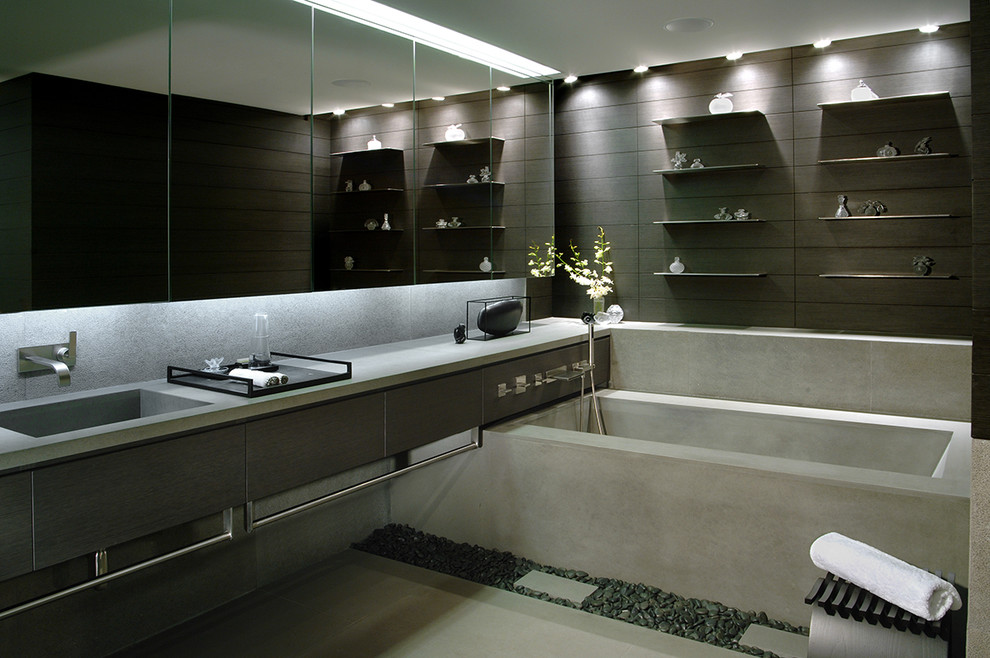 На фото: ванная комната в современном стиле с столешницей из бетона с