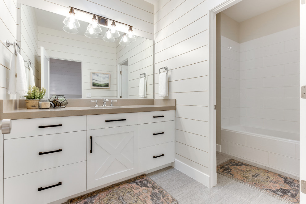 Design ideas for a farmhouse bathroom in Salt Lake City with flat-panel cabinets and light wood cabinets.