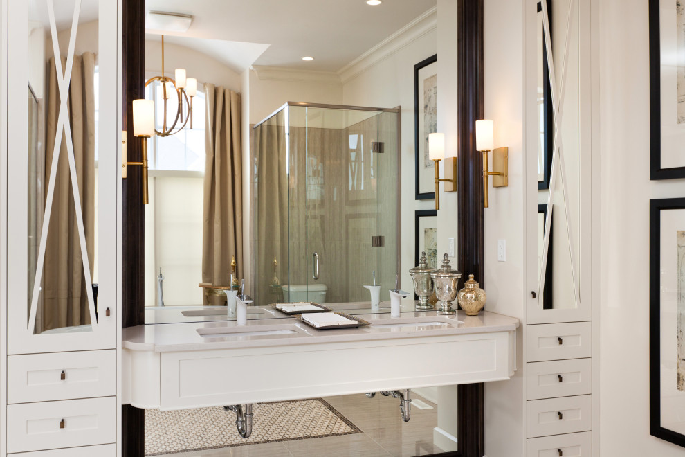 Large classic ensuite bathroom in Toronto with shaker cabinets, white cabinets, a freestanding bath, beige walls, mosaic tile flooring, a submerged sink, marble worktops, beige floors, beige worktops, double sinks and a built in vanity unit.