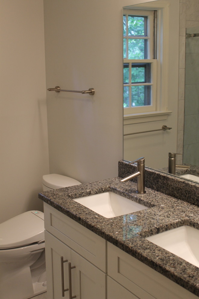 Example of a mid-sized transitional bathroom design in DC Metro