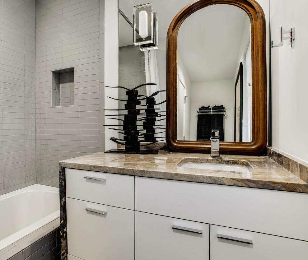 Bathroom - mid-sized modern master gray tile and ceramic tile bathroom idea in Dallas with an undermount sink, flat-panel cabinets, white cabinets, white walls and marble countertops