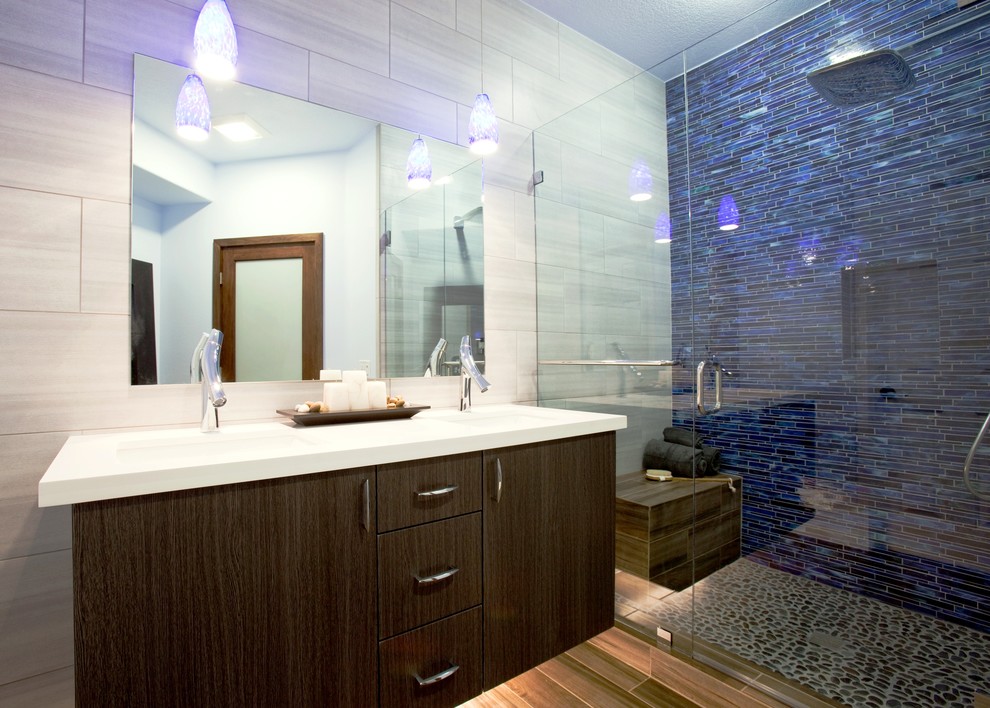 Inspiration for a mid-sized modern master blue tile and glass tile porcelain tile alcove shower remodel in Los Angeles with an undermount sink, flat-panel cabinets, dark wood cabinets, quartz countertops and white walls
