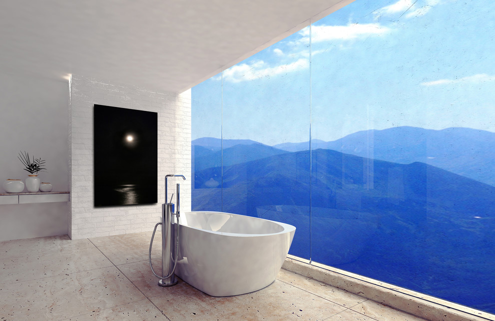 Ejemplo de cuarto de baño principal moderno con bañera exenta y paredes blancas