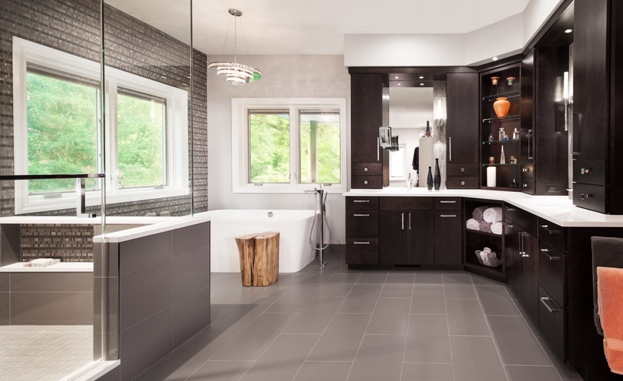 Example of a mid-sized minimalist master gray tile and mosaic tile porcelain tile bathroom design in Omaha with an undermount sink, flat-panel cabinets, dark wood cabinets, quartz countertops, a two-piece toilet and gray walls