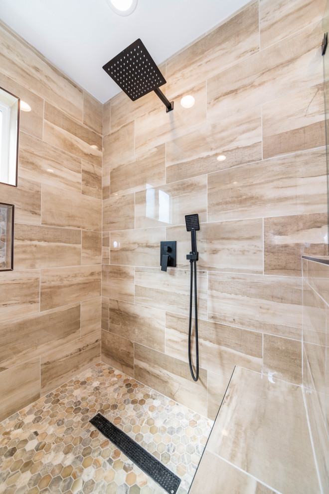 Inspiration for a large modern ensuite bathroom in Los Angeles with raised-panel cabinets, dark wood cabinets, a freestanding bath, a walk-in shower, a one-piece toilet, beige tiles, ceramic tiles, white walls, porcelain flooring, a built-in sink, quartz worktops, beige floors, a hinged door, white worktops, double sinks and a built in vanity unit.