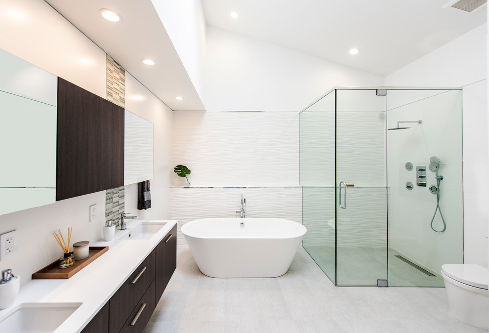 Small minimalist master white tile and porcelain tile porcelain tile bathroom photo in Miami with flat-panel cabinets, medium tone wood cabinets, a one-piece toilet and an undermount sink