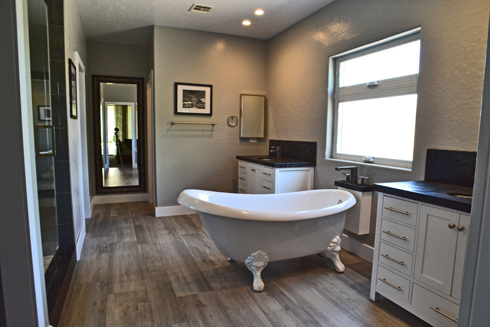 Bathroom - transitional black tile and porcelain tile porcelain tile bathroom idea in Las Vegas with shaker cabinets, white cabinets, a two-piece toilet, gray walls, an undermount sink and granite countertops