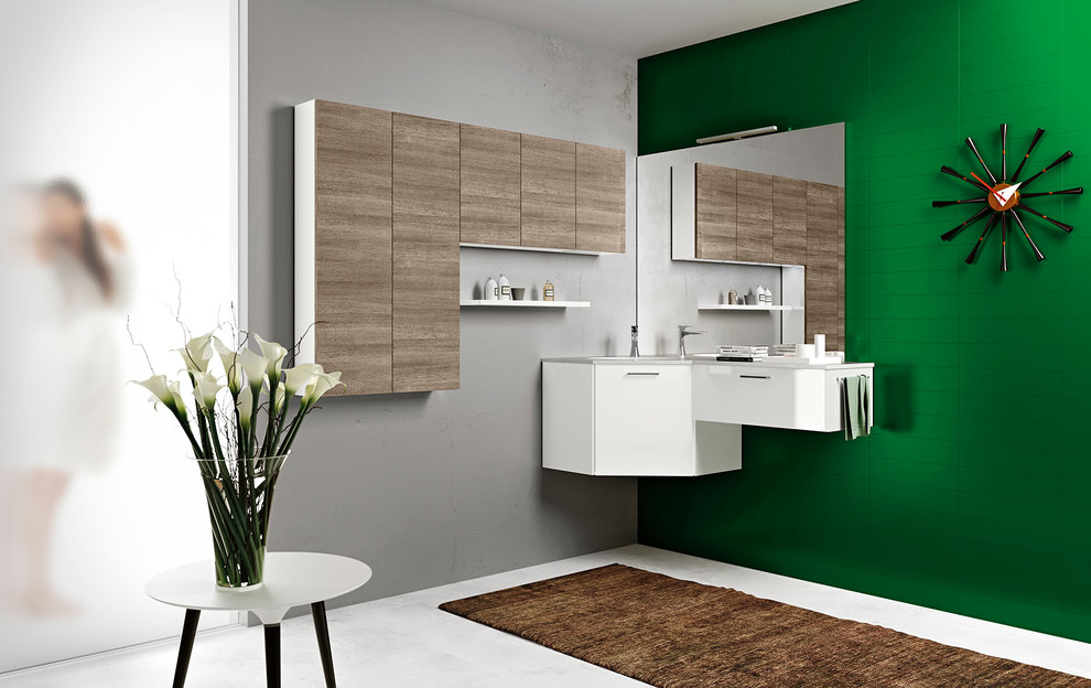 Idéer för att renovera ett litet funkis badrum med dusch, med ett integrerad handfat, släta luckor, skåp i mellenmörkt trä, laminatbänkskiva, ett hörnbadkar, en hörndusch, en toalettstol med hel cisternkåpa, vit kakel, keramikplattor, gröna väggar och betonggolv