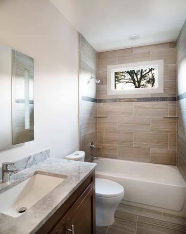 Свежая идея для дизайна: ванная комната среднего размера в стиле модернизм с фасадами в стиле шейкер, темными деревянными фасадами, накладной ванной, унитазом-моноблоком, серой плиткой, керамогранитной плиткой, серыми стенами, полом из керамогранита, врезной раковиной и мраморной столешницей - отличное фото интерьера