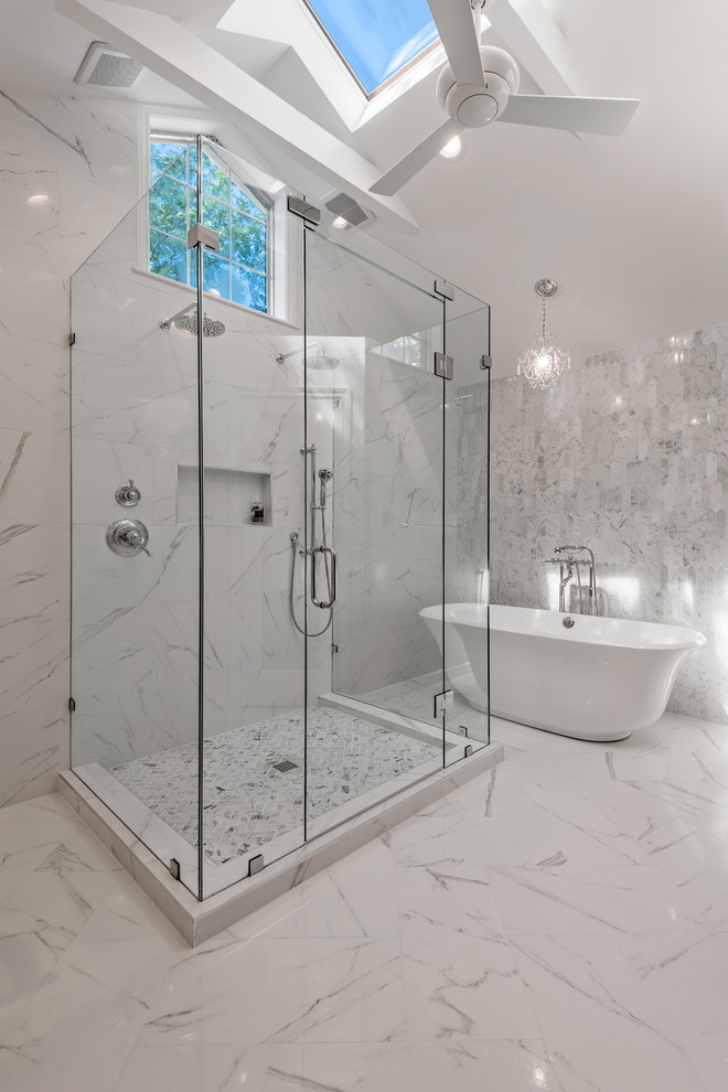 Inspiration for a modern master gray tile and porcelain tile porcelain tile and gray floor freestanding bathtub remodel in Dallas with raised-panel cabinets, beige cabinets, gray walls, a drop-in sink, granite countertops and a hinged shower door