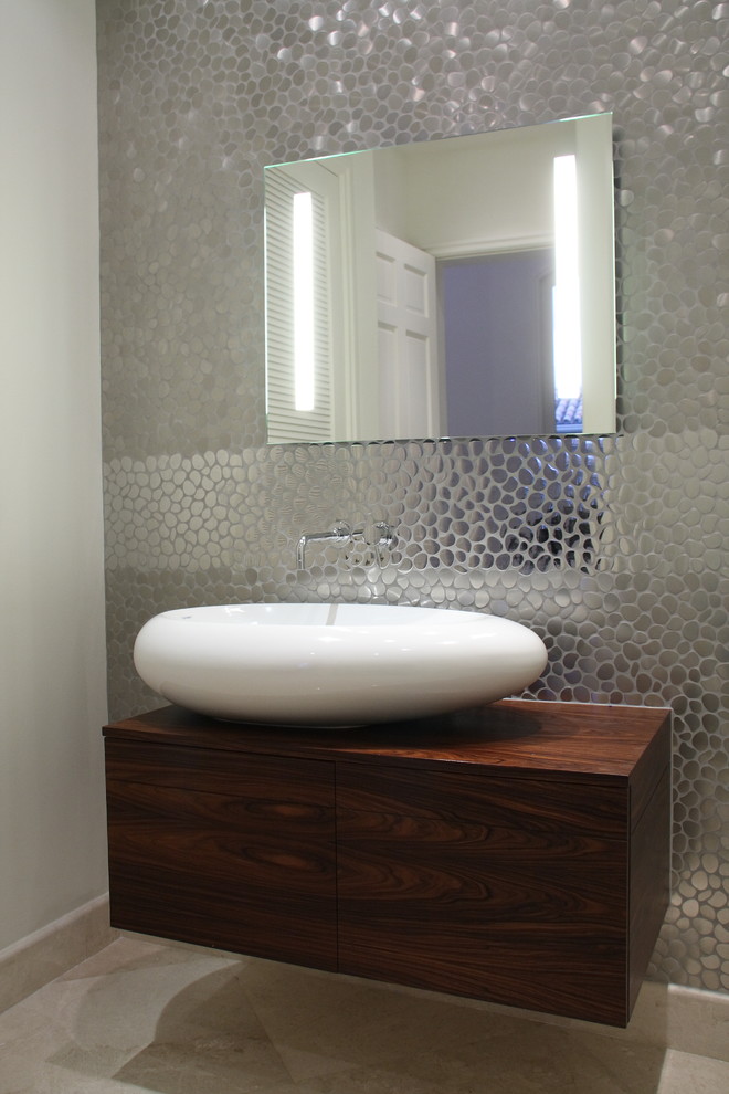Trendy bathroom photo in Miami with a vessel sink