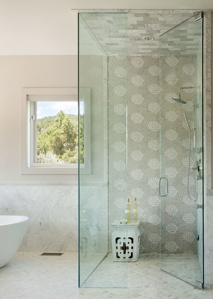 Inspiration for a large traditional ensuite bathroom in Denver with a built-in shower, flat-panel cabinets, distressed cabinets, a freestanding bath, grey tiles, mosaic tiles, white walls, marble flooring, a vessel sink and engineered stone worktops.