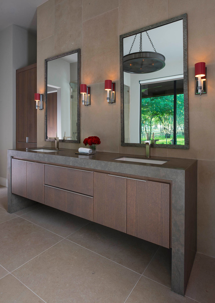 На фото: ванная комната в современном стиле с плоскими фасадами, темными деревянными фасадами, бежевой плиткой и врезной раковиной