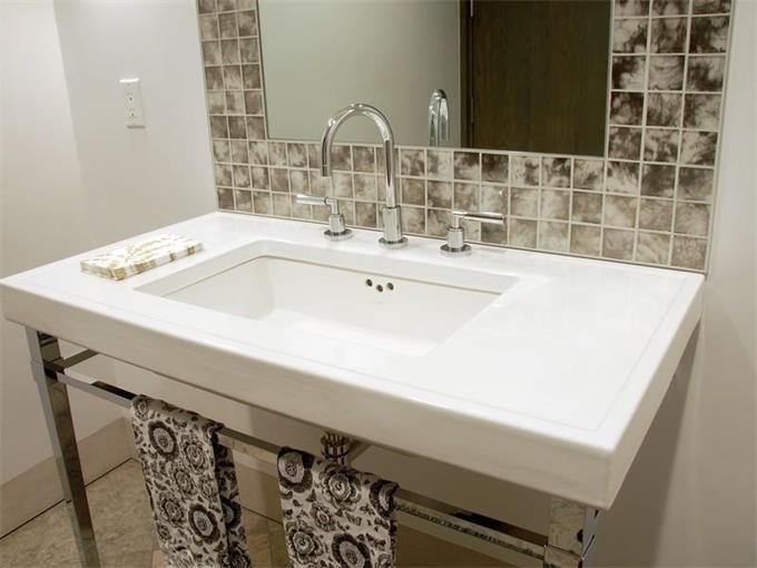 Inspiration for a modern master bathroom remodel in Other with a pedestal sink and white walls