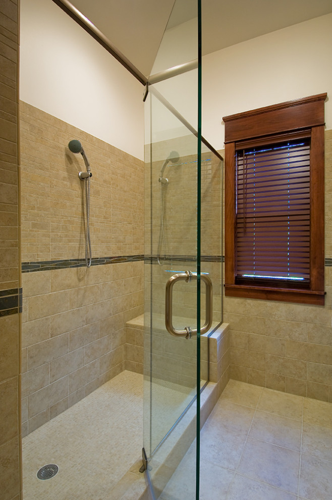 Alcove shower - large craftsman master beige tile and porcelain tile porcelain tile and beige floor alcove shower idea in New York with flat-panel cabinets, dark wood cabinets, beige walls, a vessel sink, tile countertops and gray countertops