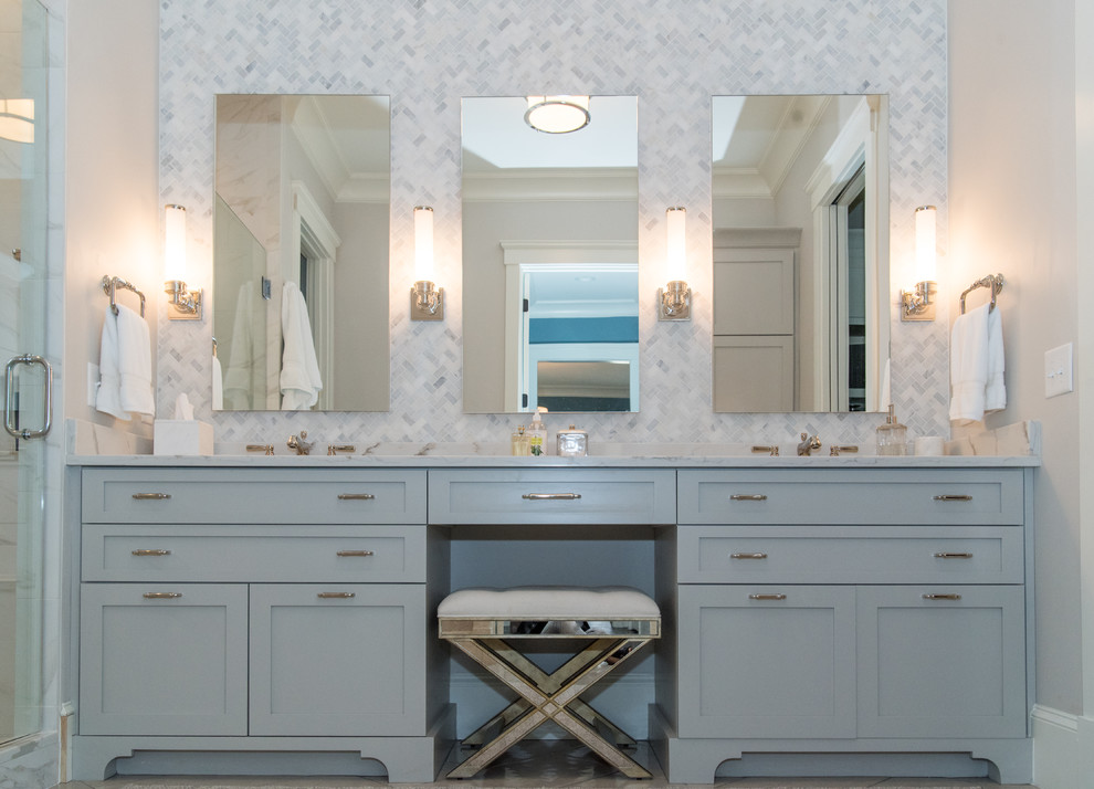 Mid-sized transitional master gray tile, white tile and mosaic tile ceramic tile alcove shower photo in Atlanta with shaker cabinets, gray cabinets, white walls, an undermount sink, a two-piece toilet and marble countertops