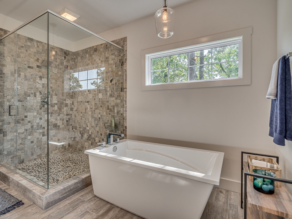 Inspiration for a large craftsman master beige tile and ceramic tile ceramic tile, gray floor and double-sink bathroom remodel with shaker cabinets, white cabinets, white walls, an undermount sink, quartz countertops, a hinged shower door, gray countertops and a built-in vanity