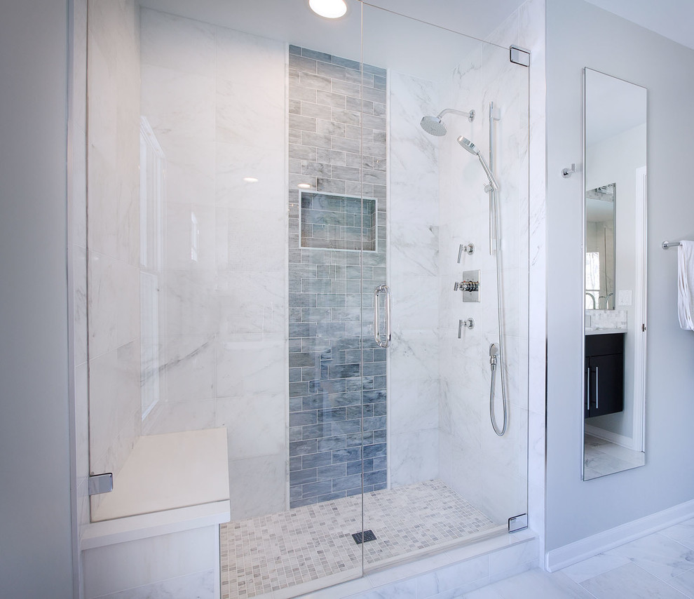 Example of a large trendy master white tile, gray tile, multicolored tile and marble tile marble floor and white floor alcove shower design in Chicago with an undermount sink, flat-panel cabinets, quartz countertops, a one-piece toilet, black cabinets, gray walls and a hinged shower door