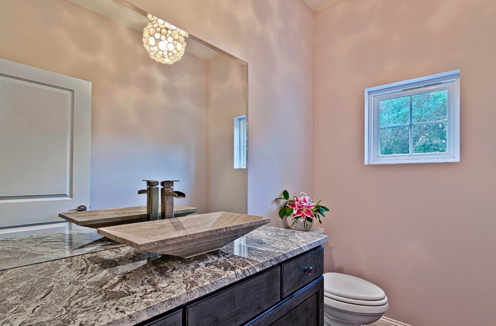На фото: ванная комната в современном стиле с бежевой плиткой и серой столешницей с