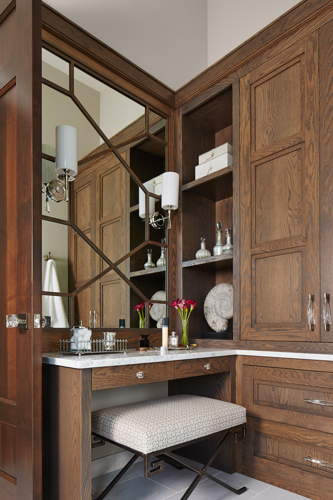 Example of a mid-sized transitional white tile marble floor and white floor bathroom design in Minneapolis with brown cabinets and recessed-panel cabinets