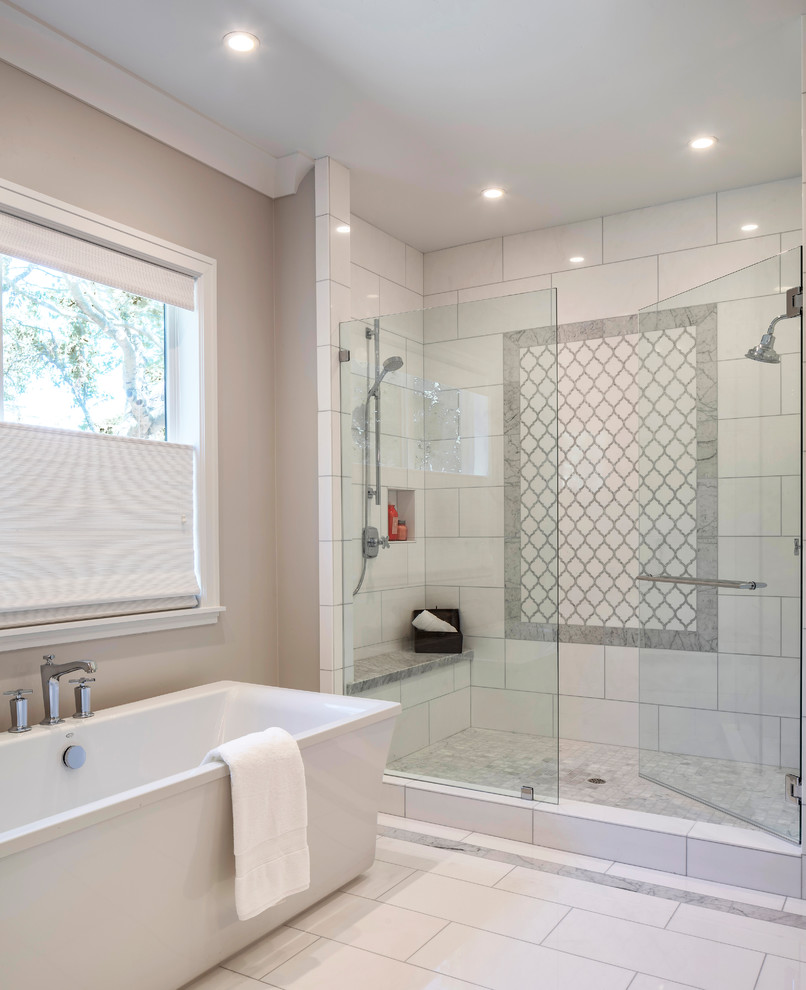 Inspiration for a large country master white tile and stone tile marble floor and white floor bathroom remodel in San Francisco with furniture-like cabinets, black cabinets, a one-piece toilet, gray walls, an undermount sink, marble countertops, a hinged shower door and gray countertops