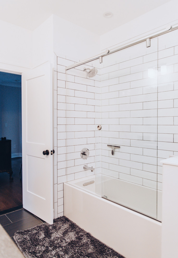 Photo of a medium sized modern family bathroom in New York with an alcove shower, ceramic tiles, a single sink and a freestanding vanity unit.