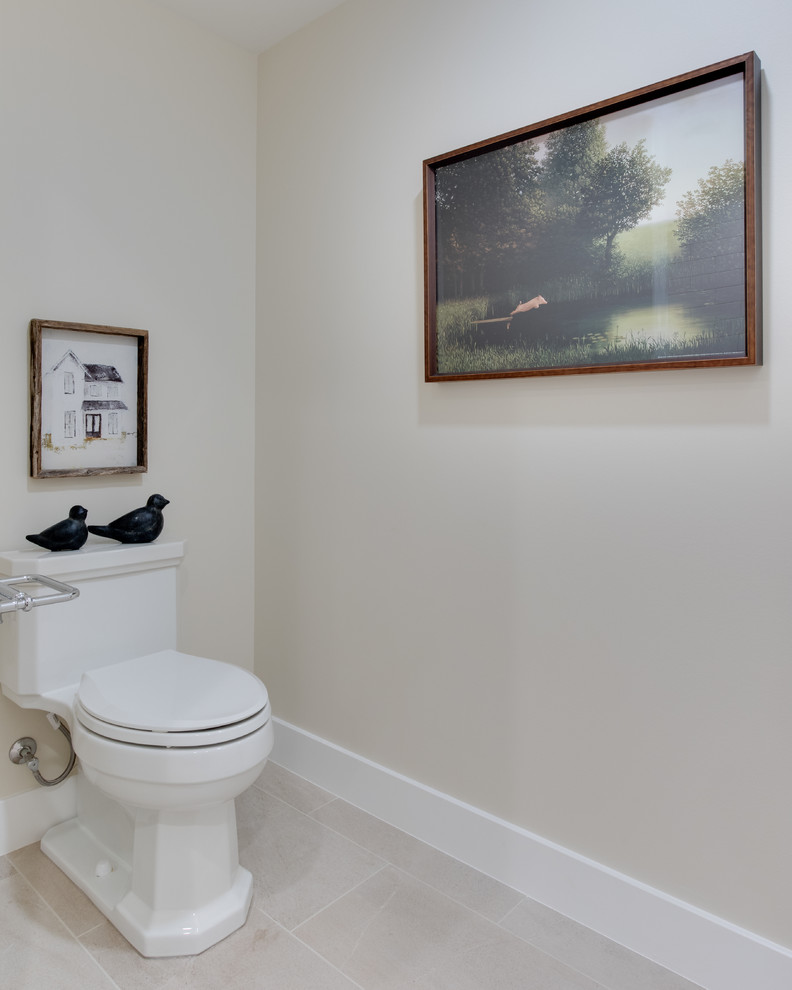 Cottage multicolored tile ceramic tile and beige floor powder room photo in Salt Lake City with shaker cabinets, white cabinets, a one-piece toilet, white walls, an undermount sink and beige countertops
