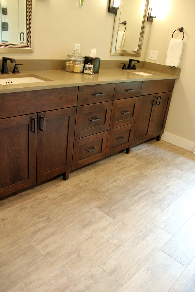 This is an example of a large contemporary ensuite bathroom in Denver with shaker cabinets, dark wood cabinets, a built-in bath, an alcove shower, blue tiles, white tiles, mosaic tiles, beige walls, laminate floors, a submerged sink, quartz worktops, beige floors, a hinged door and grey worktops.