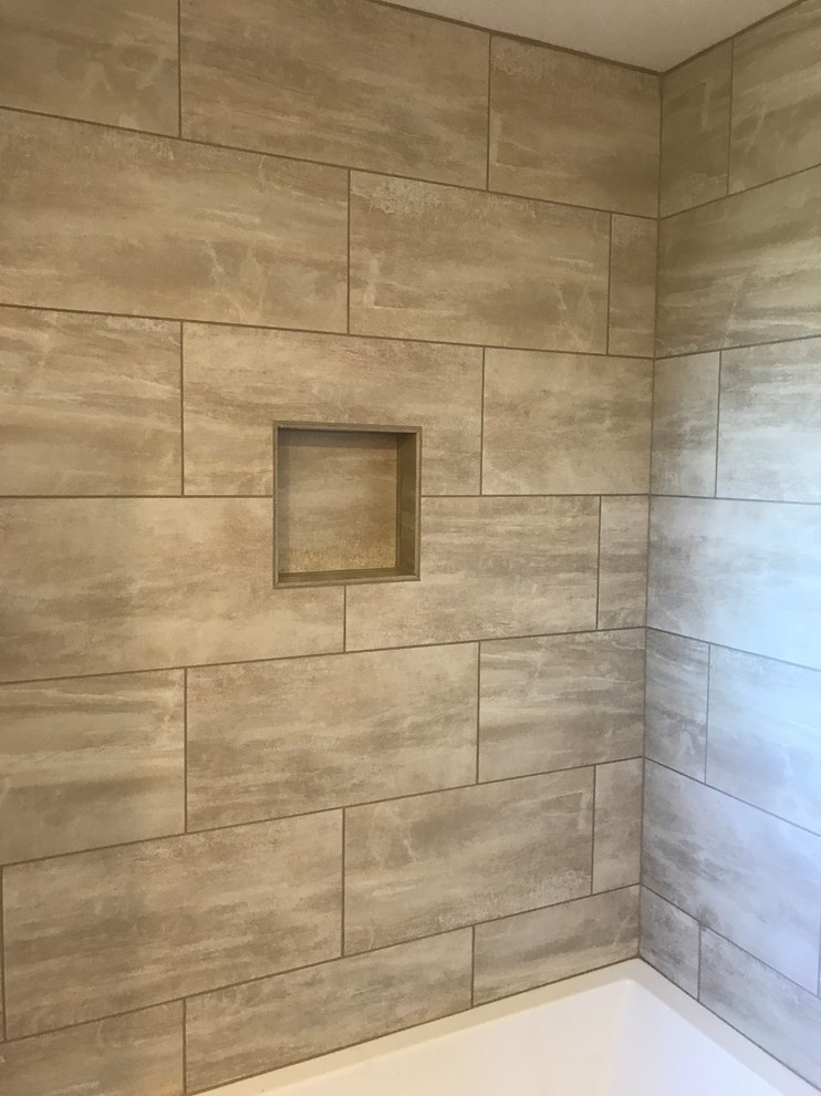 Example of a mid-sized country 3/4 beige tile and porcelain tile porcelain tile and beige floor tub/shower combo design in Sacramento with beige walls