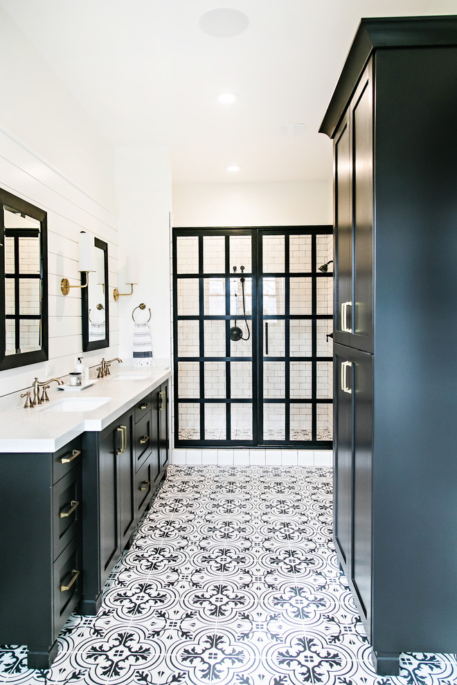 Inspiration for a cottage master multicolored floor bathroom remodel in Salt Lake City with shaker cabinets, black cabinets, white walls and an undermount sink