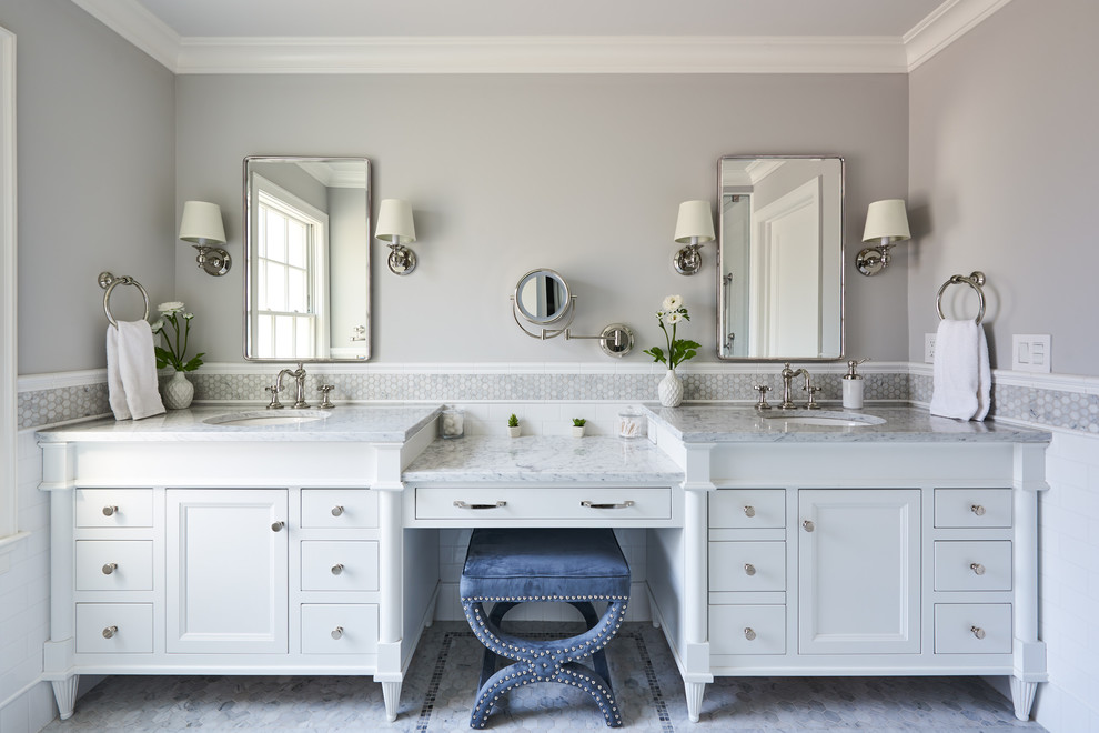 Example of a transitional white tile and subway tile gray floor bathroom design in New York with furniture-like cabinets, white cabinets, gray walls, an undermount sink and gray countertops