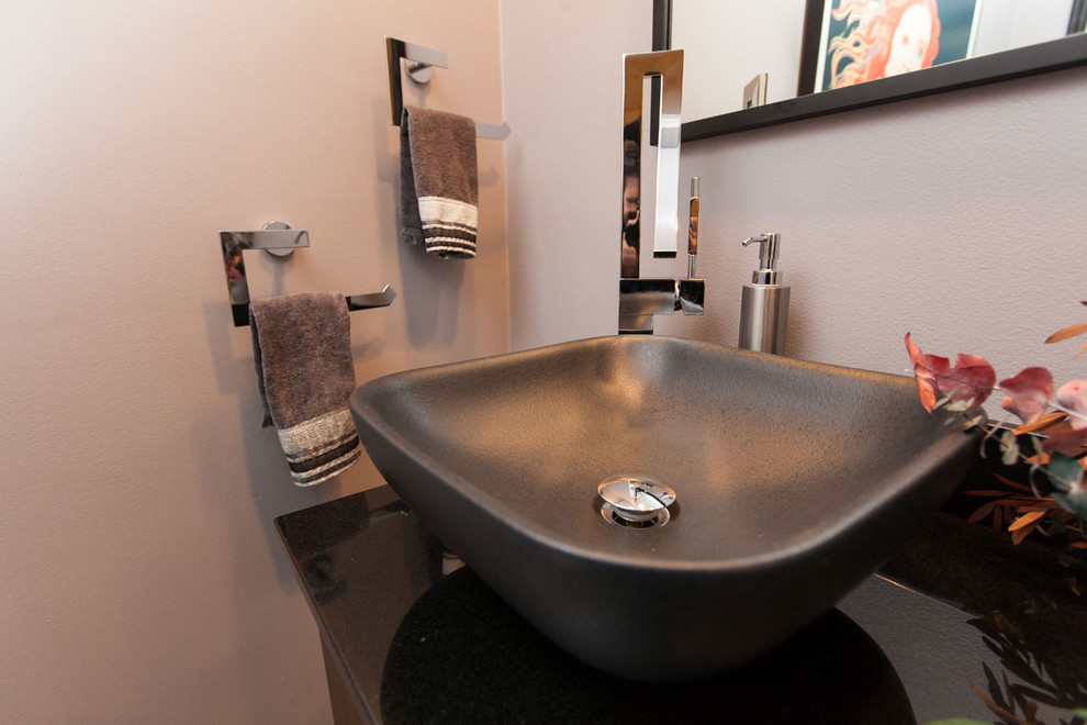 World-inspired bathroom in Los Angeles with a vessel sink.
