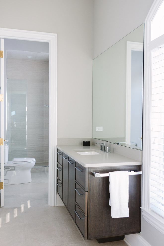 Medium sized classic shower room bathroom in Chicago with freestanding cabinets, dark wood cabinets, an alcove shower, a two-piece toilet, white tiles, porcelain tiles, grey walls, porcelain flooring, a submerged sink, tiled worktops, multi-coloured floors, a hinged door and white worktops.