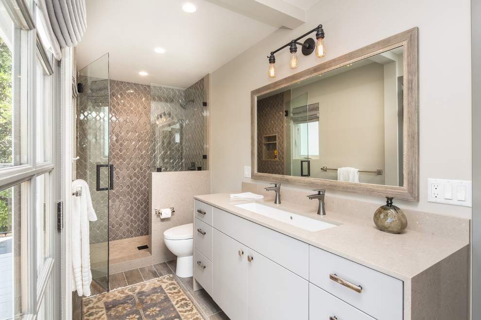 Example of a minimalist master porcelain tile alcove shower design in Los Angeles with flat-panel cabinets, white cabinets, beige walls, an undermount sink, quartzite countertops and a hinged shower door