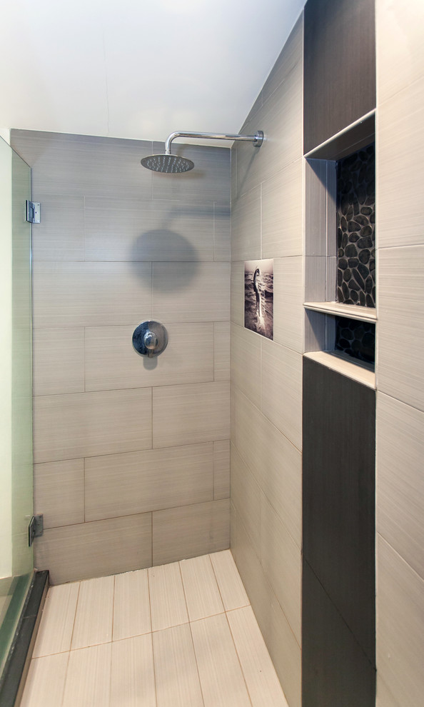 Example of a mid-sized minimalist master gray tile and porcelain tile porcelain tile and gray floor double shower design in Los Angeles with flat-panel cabinets, white cabinets, a one-piece toilet, white walls, a vessel sink, quartzite countertops, a hinged shower door and white countertops