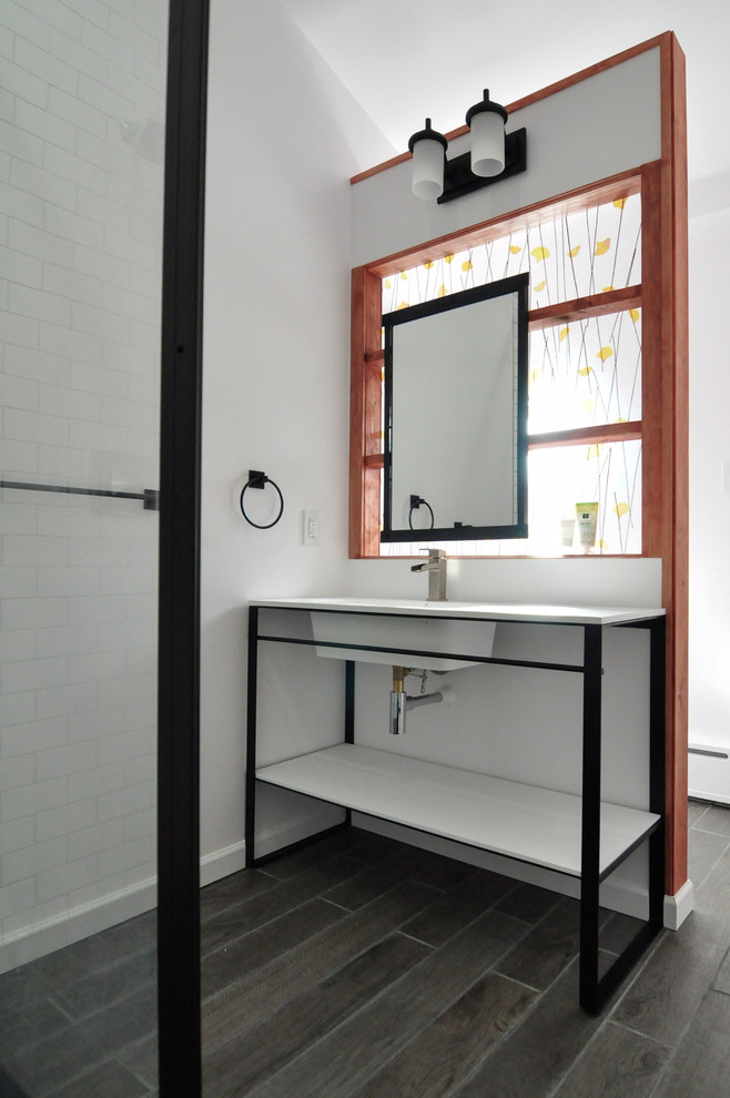 Alcove shower - large modern master white tile and subway tile ceramic tile alcove shower idea in Philadelphia with a trough sink, open cabinets, black cabinets, a two-piece toilet and white walls