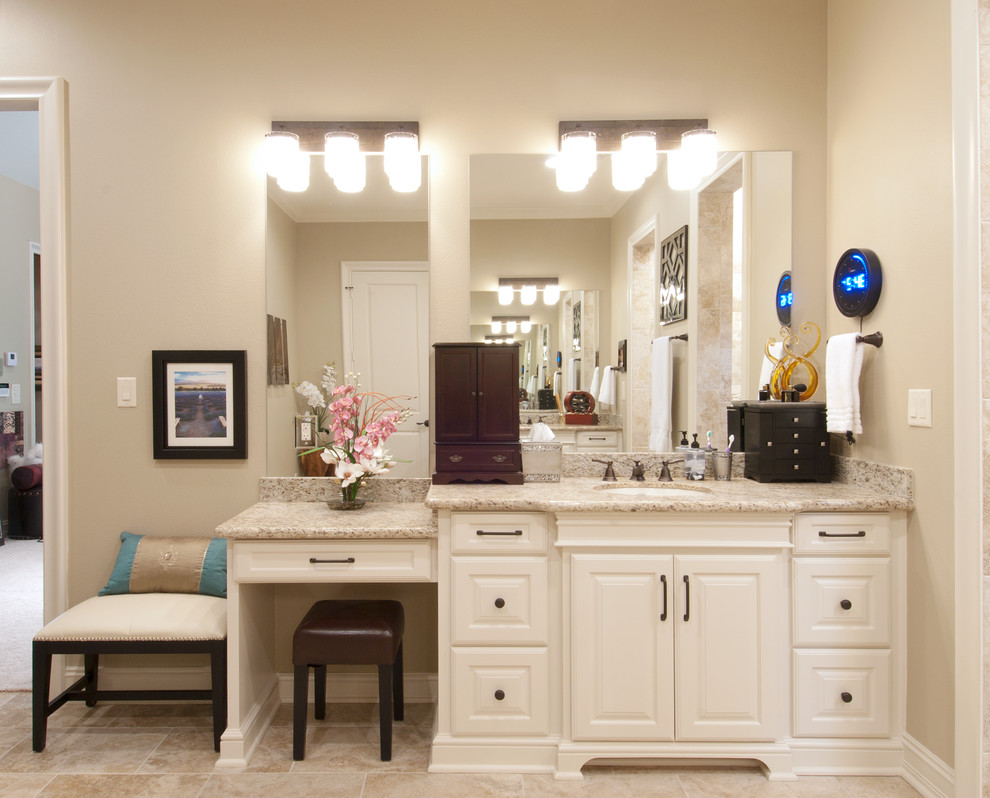 Bathroom - large industrial master beige tile and porcelain tile porcelain tile bathroom idea in Dallas with an undermount sink, raised-panel cabinets, white cabinets, granite countertops, a two-piece toilet and beige walls