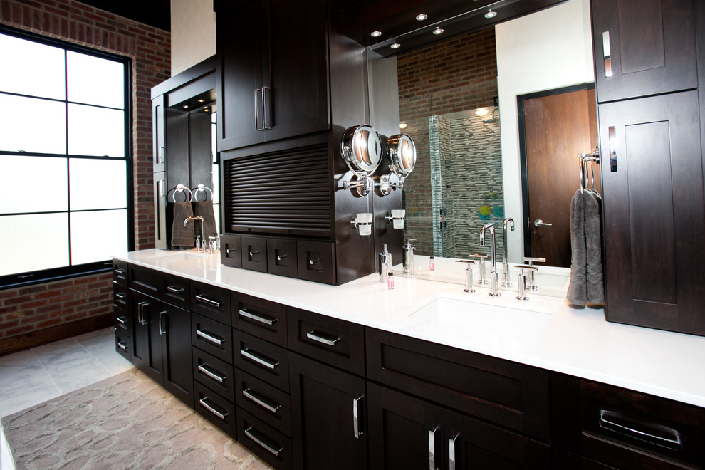 Bathroom - industrial bathroom idea in St Louis with recessed-panel cabinets and dark wood cabinets