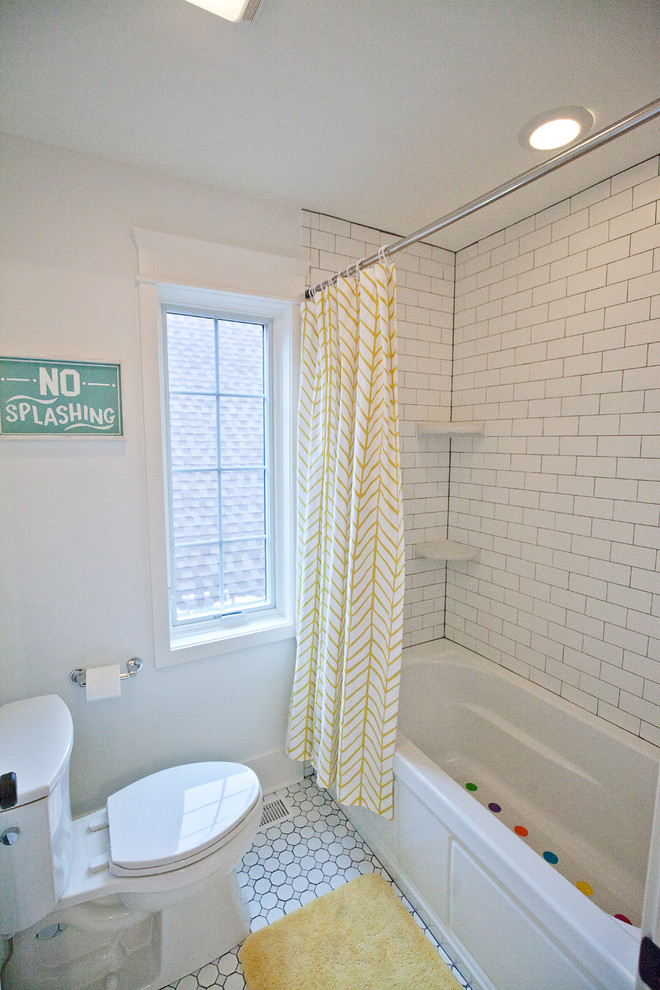Photo of a medium sized classic family bathroom in Chicago with shaker cabinets, black cabinets, a built-in bath, a shower/bath combination, a two-piece toilet, white tiles, metro tiles, white walls, mosaic tile flooring, a trough sink, engineered stone worktops, white floors and a shower curtain.