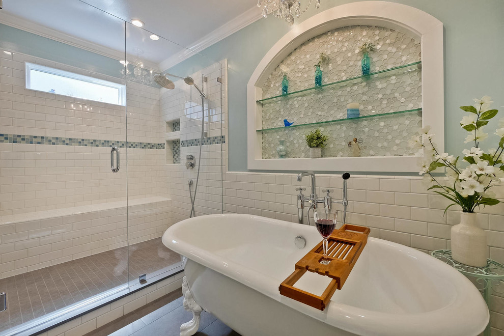 This is an example of a large classic ensuite bathroom in San Francisco with shaker cabinets, white cabinets, a claw-foot bath, a corner shower, a two-piece toilet, white tiles, blue walls, ceramic flooring, a submerged sink, engineered stone worktops, grey floors, a hinged door and metro tiles.