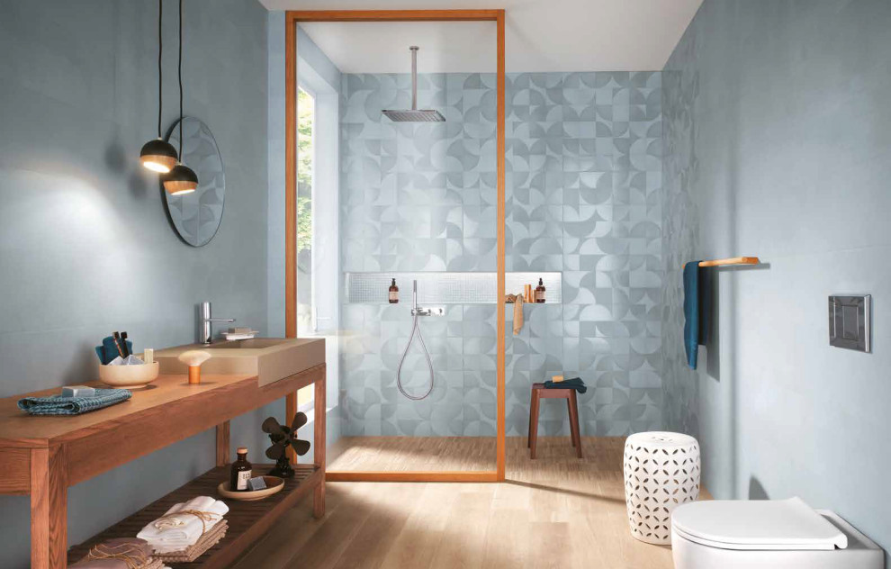 Modern light blue and grey bathroom with wood tones Modern Bathroom