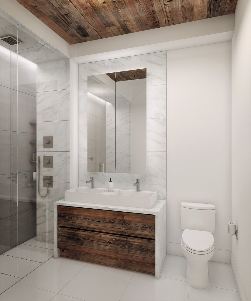 Mid-sized trendy master white tile and porcelain tile porcelain tile bathroom photo in New York with flat-panel cabinets, medium tone wood cabinets, a two-piece toilet, white walls, a vessel sink and marble countertops