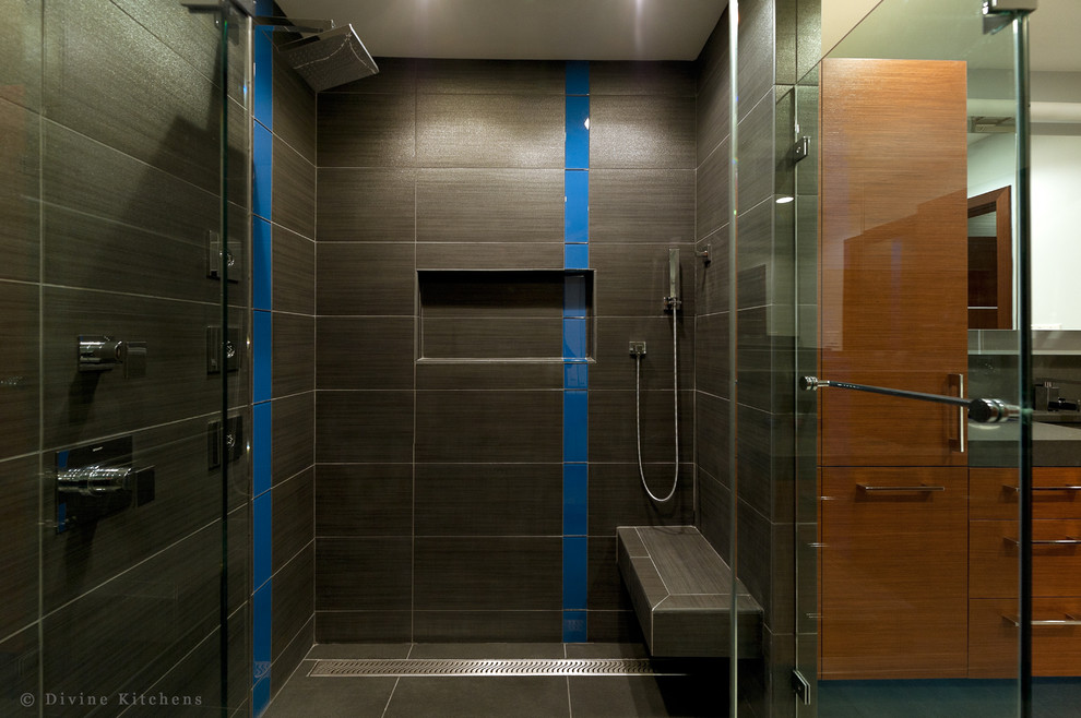 Inspiration for a large modern master brown tile and porcelain tile porcelain tile corner shower remodel in Boston with an undermount sink, flat-panel cabinets, dark wood cabinets, quartz countertops, a two-piece toilet and white walls