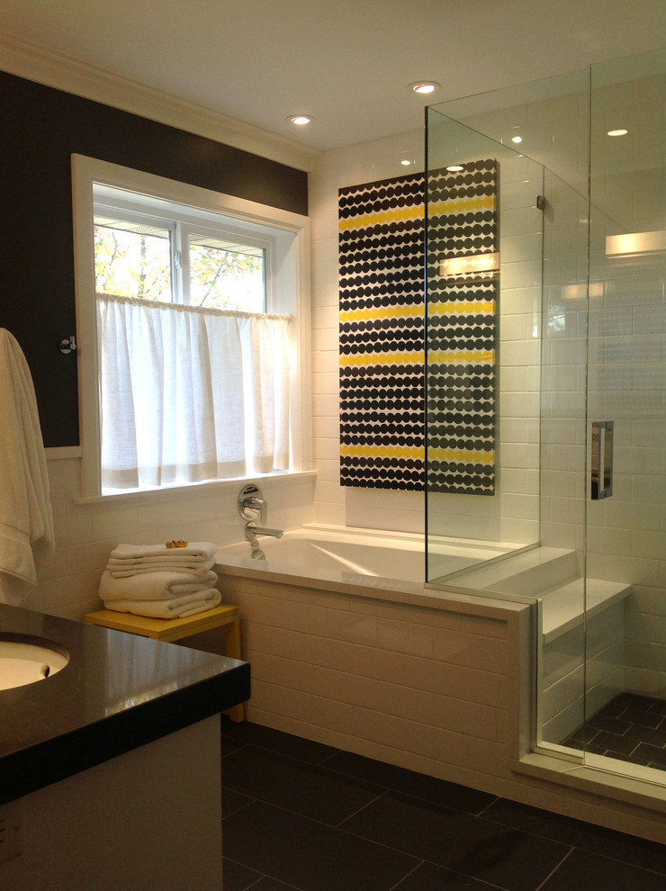 Example of a transitional white tile and ceramic tile tub/shower combo design in Salt Lake City with an undermount sink, white cabinets, quartz countertops and an undermount tub
