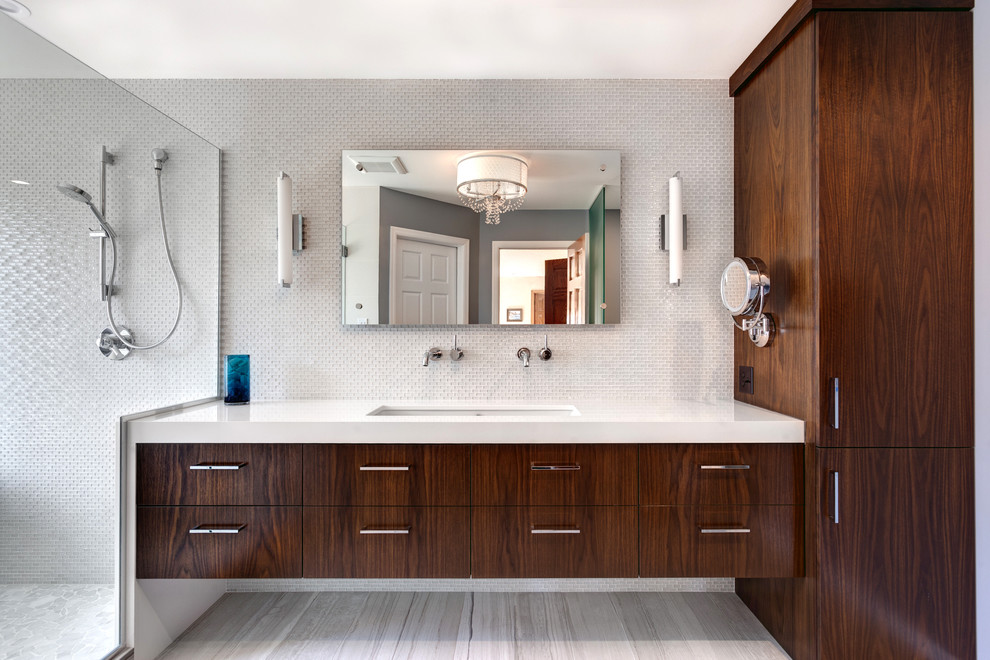 Example of a large minimalist master white tile and glass tile ceramic tile bathroom design in Minneapolis with flat-panel cabinets, dark wood cabinets, a trough sink, quartz countertops, a two-piece toilet and gray walls